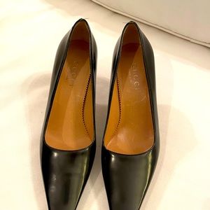 Gucci, black leather pumps with wood heel detail
